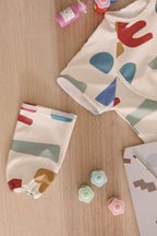 BÉABA Bib with Removable Sleeves Playful