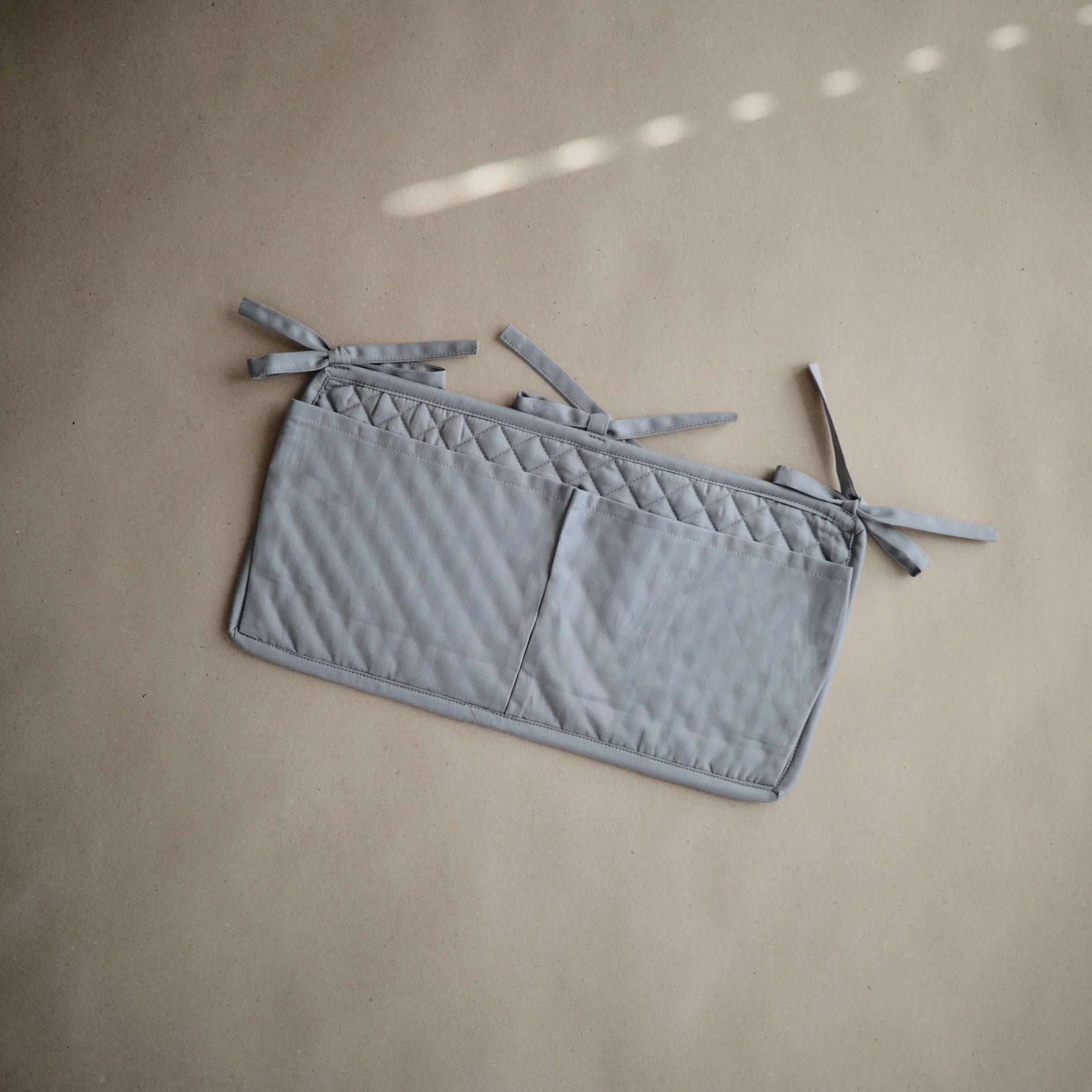 Mushie Cot Storage Pocket Tradewinds